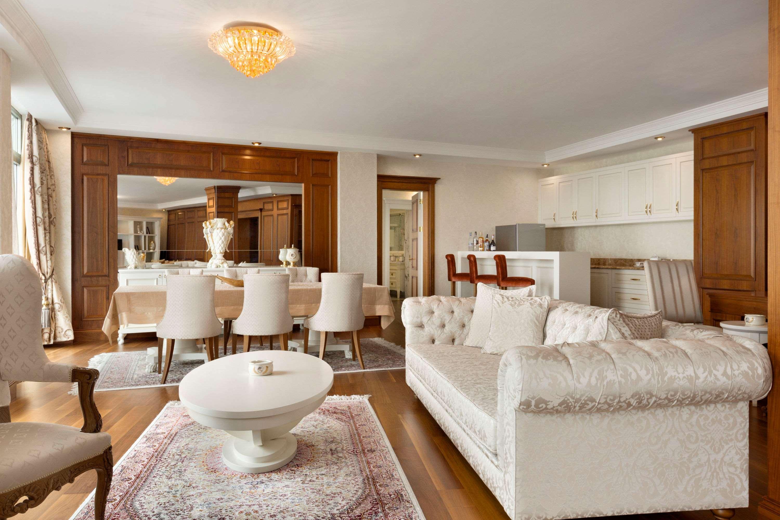 Отель Ramada By Wyndham Баку Экстерьер фото A living room in a house