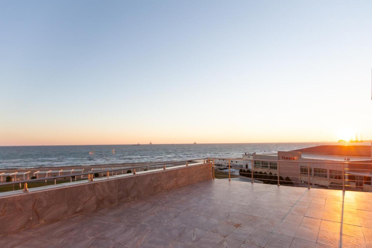 Отель Ramada By Wyndham Баку Экстерьер фото View of the Mediterranean Sea from the hotel